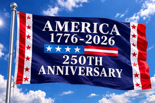 Flag celebrating America's 250th anniversary against a blue sky with clouds